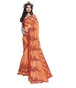Orange embroidered georgette saree with blouse