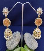 Gold crystal jhumkas