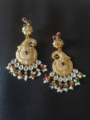 Gold earrings 1