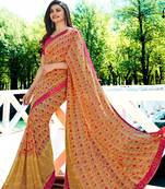 orange printed georgette saree with blouse