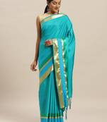 Turquoise printed silk cotton saree with blouse