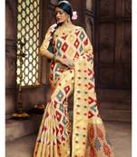 Cream woven banarasi silk saree with blouse