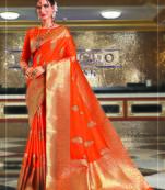 Orange woven banarasi silk saree with blouse