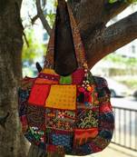 Multicolored Real Mirror Worked Banjara Bag With Hanging Pompom Tassels