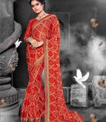 Red woven chiffon saree with blouse