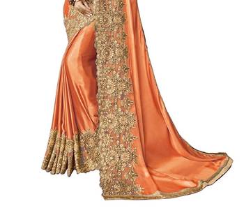 Orange embroidered lycra saree with blouse 4