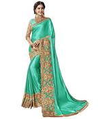 Green embroidered lycra saree with blouse