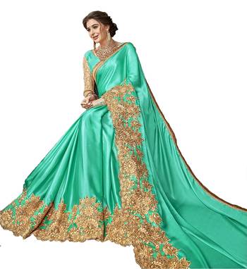 Green embroidered lycra saree with blouse 4