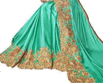 Green embroidered lycra saree with blouse 5
