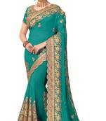 Green embroidered silk saree with blouse