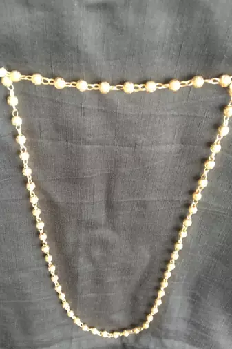 golden alloy necklace chain with traditional pearl work