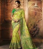 Green Woven Pure Silk Saree With Blouse