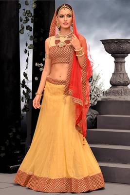 Yellow net Lehenga with Orange Dupatta 1