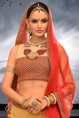 Yellow net Lehenga with Orange Dupatta 2