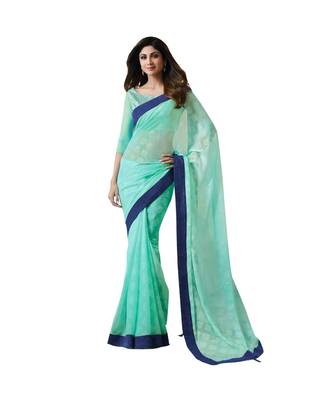 Turquoise printed chiffon saree with blouse 1
