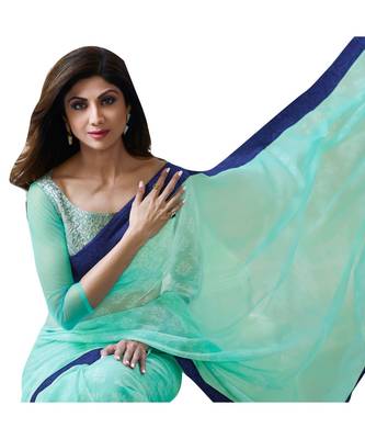 Turquoise printed chiffon saree with blouse 5