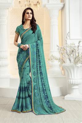 Turquoise Embroidered georgette saree with blouse 1