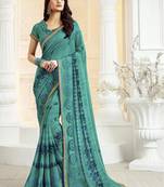 Turquoise Embroidered georgette saree with blouse