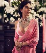 Pink embroidered georgette saree with blouse