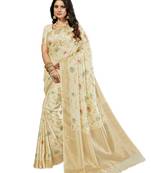 Off white woven silk blend saree with blouse