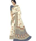 Off white woven silk blend saree with blouse