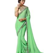 Green embroidered georgette saree with blouse