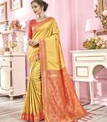 Yellow woven banarasi silk saree with blouse