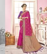 Pink woven banarasi silk saree with blouse
