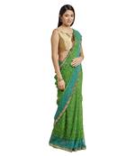 Green printed georgette saree with blouse