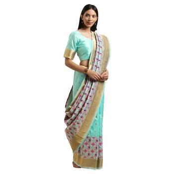 Green woven silk blend saree with blouse 1