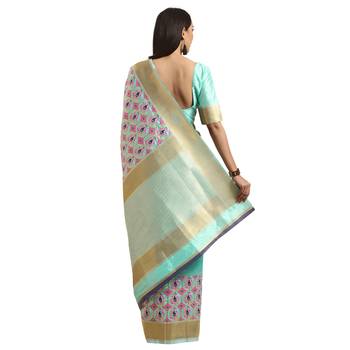 Green woven silk blend saree with blouse 2