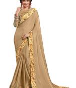 Beige embroidered georgette saree with blouse