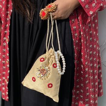 Gold Handcrafted Embroidered Silk Potli 1