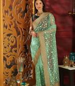 Light Green Embroidered Organza Saree With Blouse
