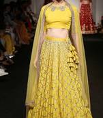 Yellow embroidered satin semi stitched lehenga