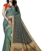 Green embroidered tussar silk saree with blouse