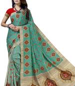 Green embroidered tussar silk saree with blouse
