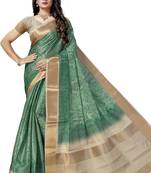 Green woven silk saree with blouse
