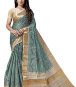 Turquoise woven silk saree with blouse