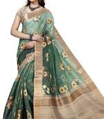 Green woven silk saree with blouse