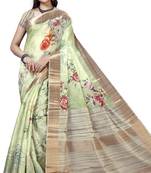 Green woven silk saree with blouse