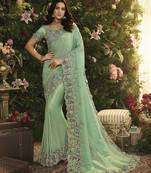 Turquoise Embroidered Pure Tissue Saree With Blouse