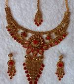 Traditional AD Zircon Stone Red And Golden Fancy Stylish Party Wear Wedding necklace earring mangtika set
