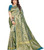Green woven silk saree with blouse