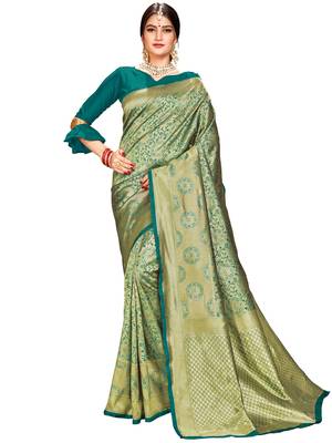 Green woven silk saree with blouse 1