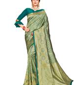 Green woven silk saree with blouse