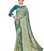 Green
 woven silk saree with blouse