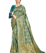 Green woven silk saree with blouse