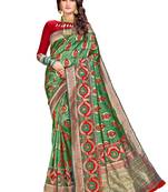 Green woven silk saree with blouse