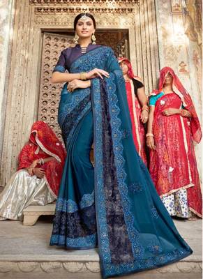 Blue embroidered georgette saree with blouse 1
